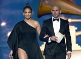 Jennifer Lopez and Pitbull present at the 55th Annual GRAMMY Awards on Feb. 10 in Los Angeles