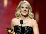 Carrie Underwood accepts the Best Country Solo Performance GRAMMY on the 55th Annual GRAMMY Awards on Feb. 10 in Los Angeles