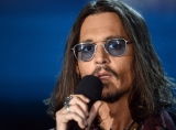 Johnny Depp lends his talents as a presenter at the 55th Annual GRAMMY Awards on Feb. 10 in Los Angeles